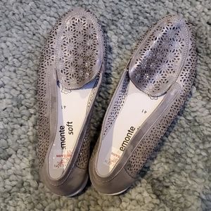 Gray loafers with silver accents